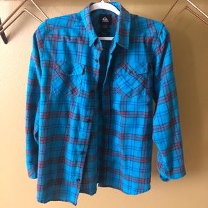 4 different color flannels.